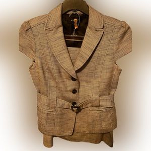 Excellent condition, tan two piece suit, no stains or scratches